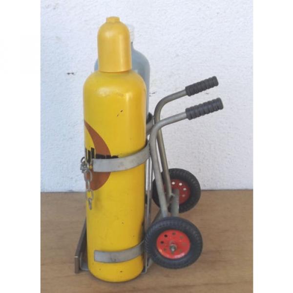 Linde Acetylene/Corgon Schnapps bottles on hand trucks - Decorational object #2 image